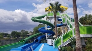 A water park with multiple slides and a central tower structure. - Windsor Hill Resort (Kissimmee)