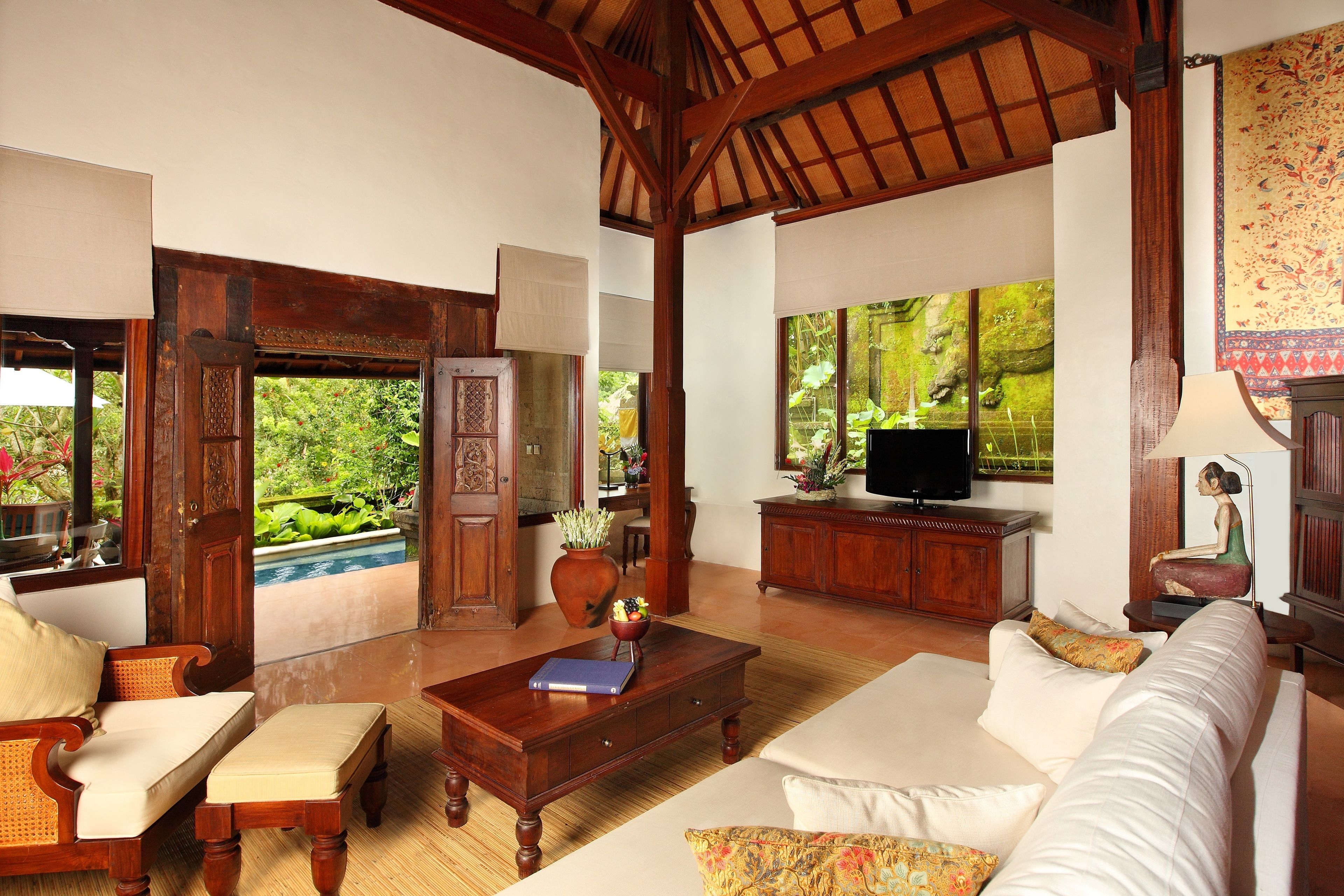 villa, 1 bedroom, private pool | living area | flat-screen tv, books