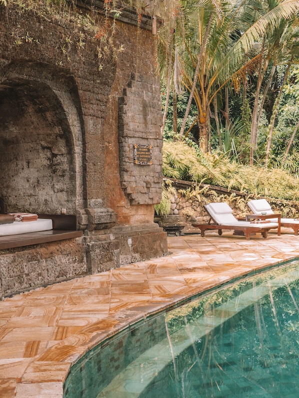 2 outdoor pools, open 7:00 AM to 8:00 PM, pool umbrellas, pool loungers
