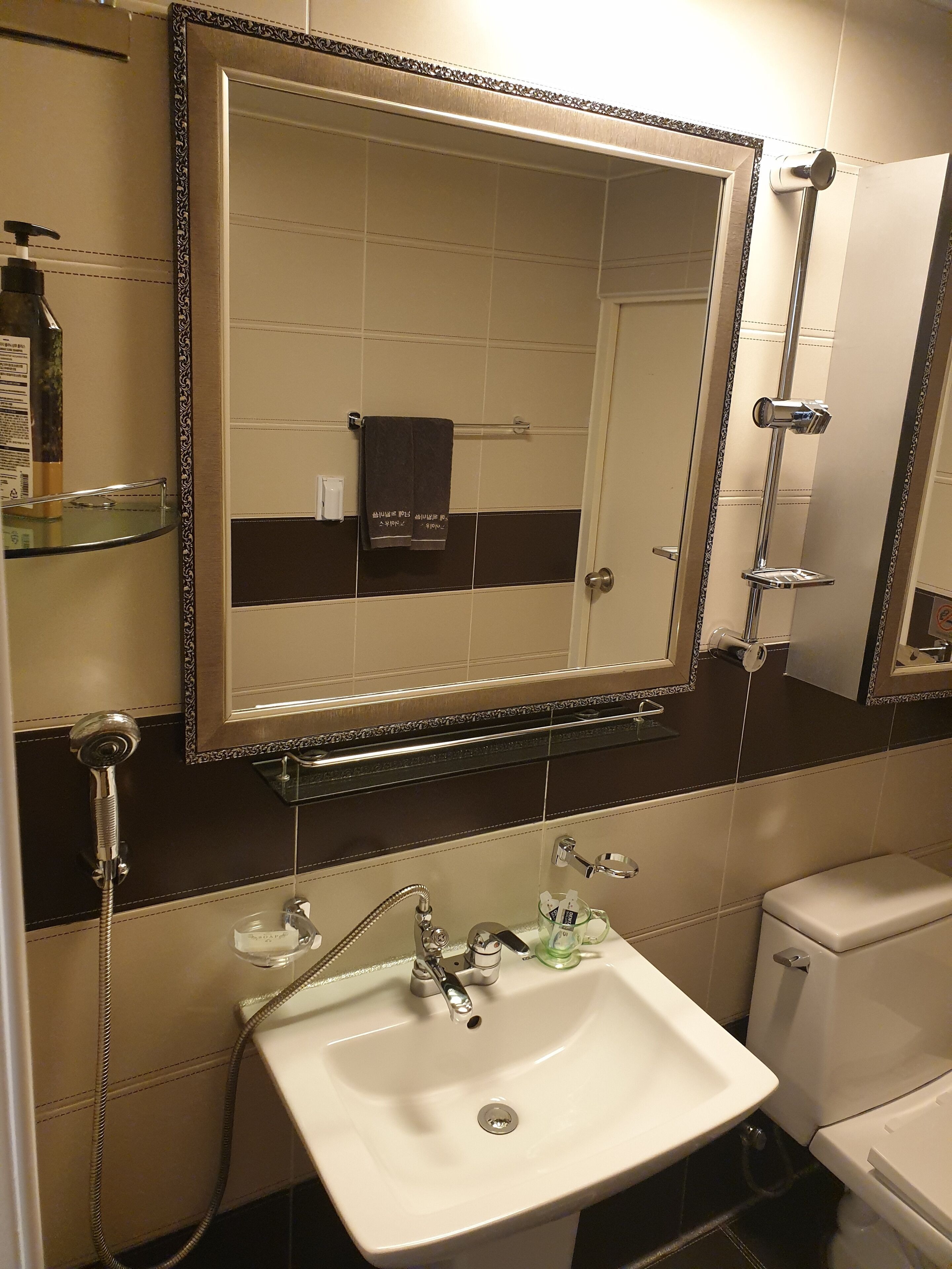 Bathroom | Shower, hair dryer, slippers, towels