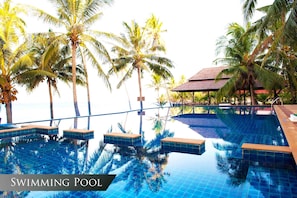 Outdoor pool, an infinity pool, sun loungers