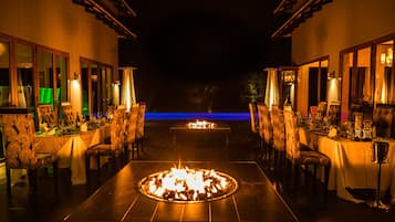 Breakfast, lunch, dinner served; Fusion cuisine, pool views