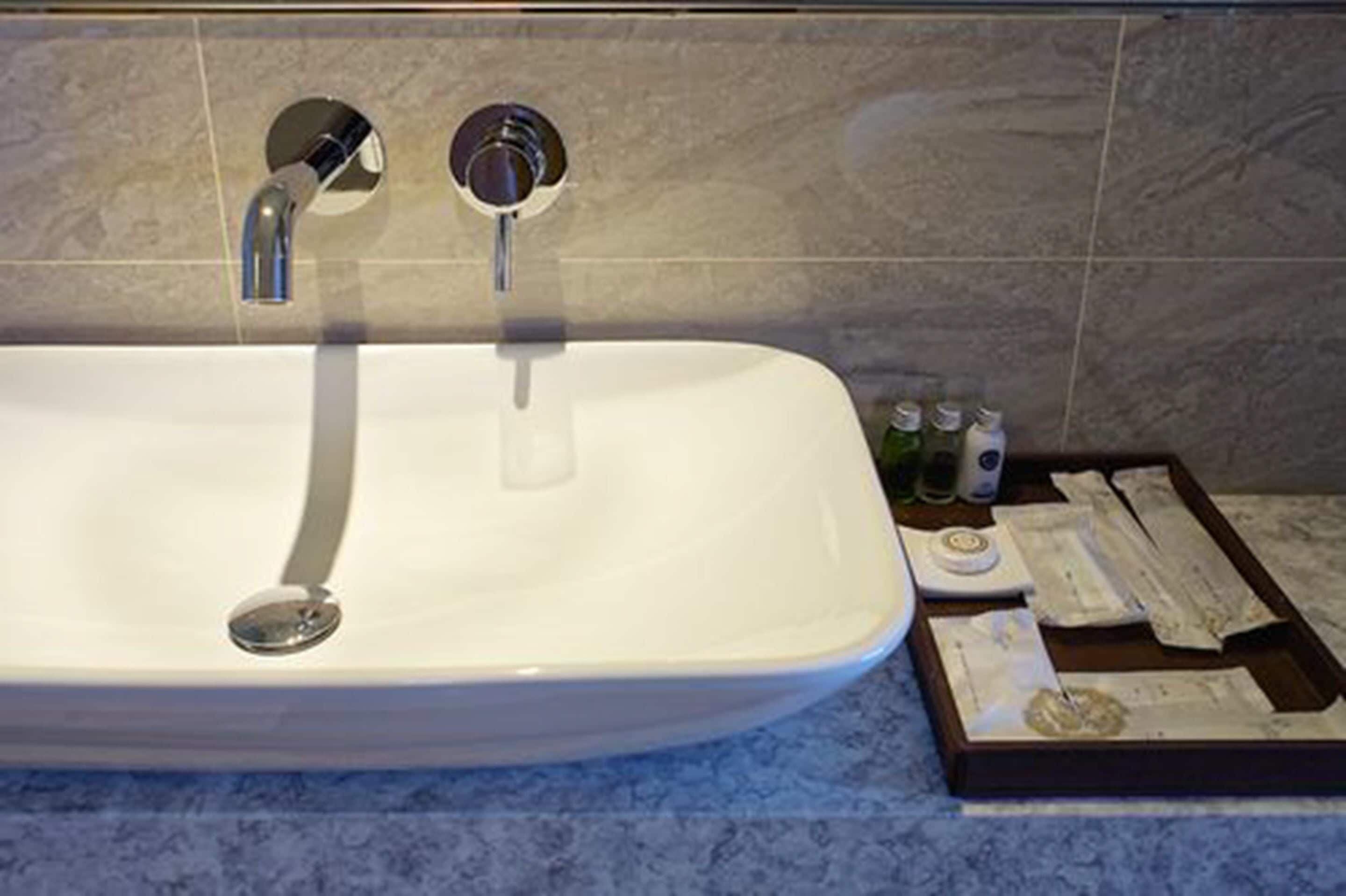 free toiletries, hair dryer, slippers, towels