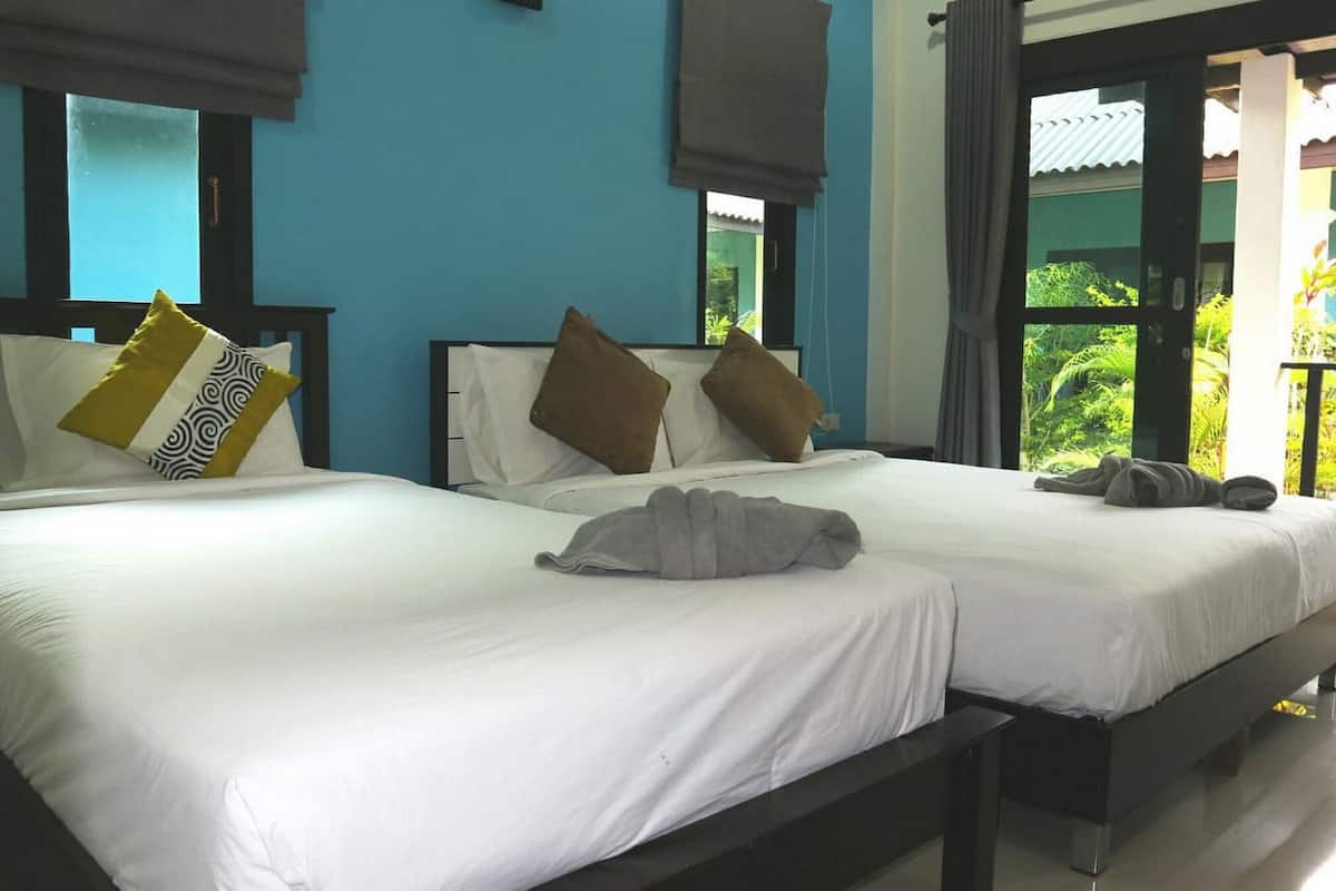 deluxe triple room, 1 bedroom, non smoking, patio | minibar, in-room safe, blackout curtains, free wifi