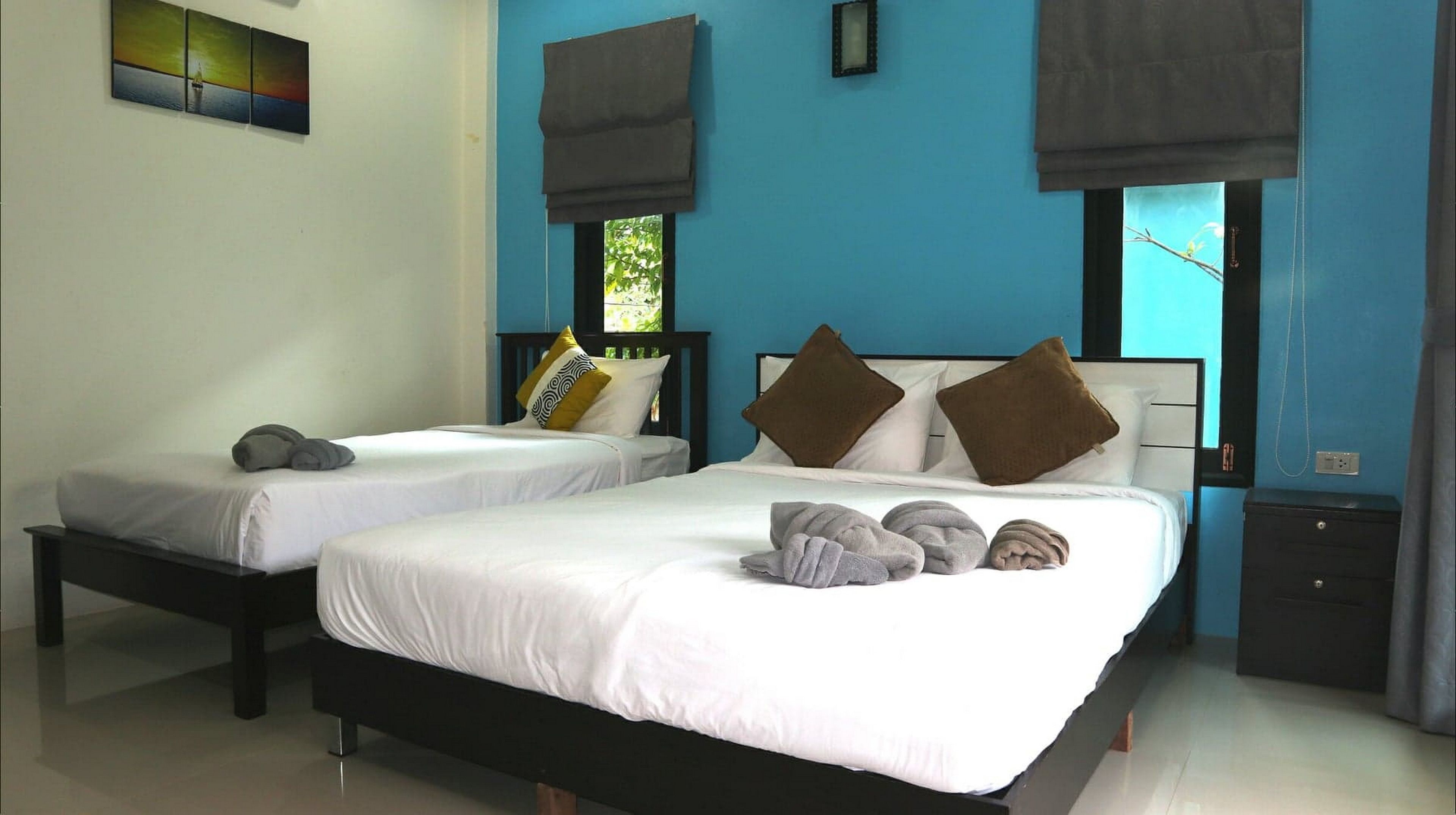 deluxe triple room, 1 bedroom, non smoking, patio | minibar, in-room safe, blackout curtains, free wifi