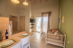 Apartment, 1 Bedroom, Lake View | Living room | LCD TV, DVD player, heated floors