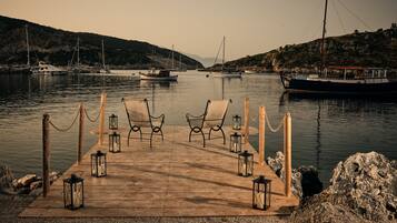 On the beach, sun loungers, beach umbrellas, beach towels