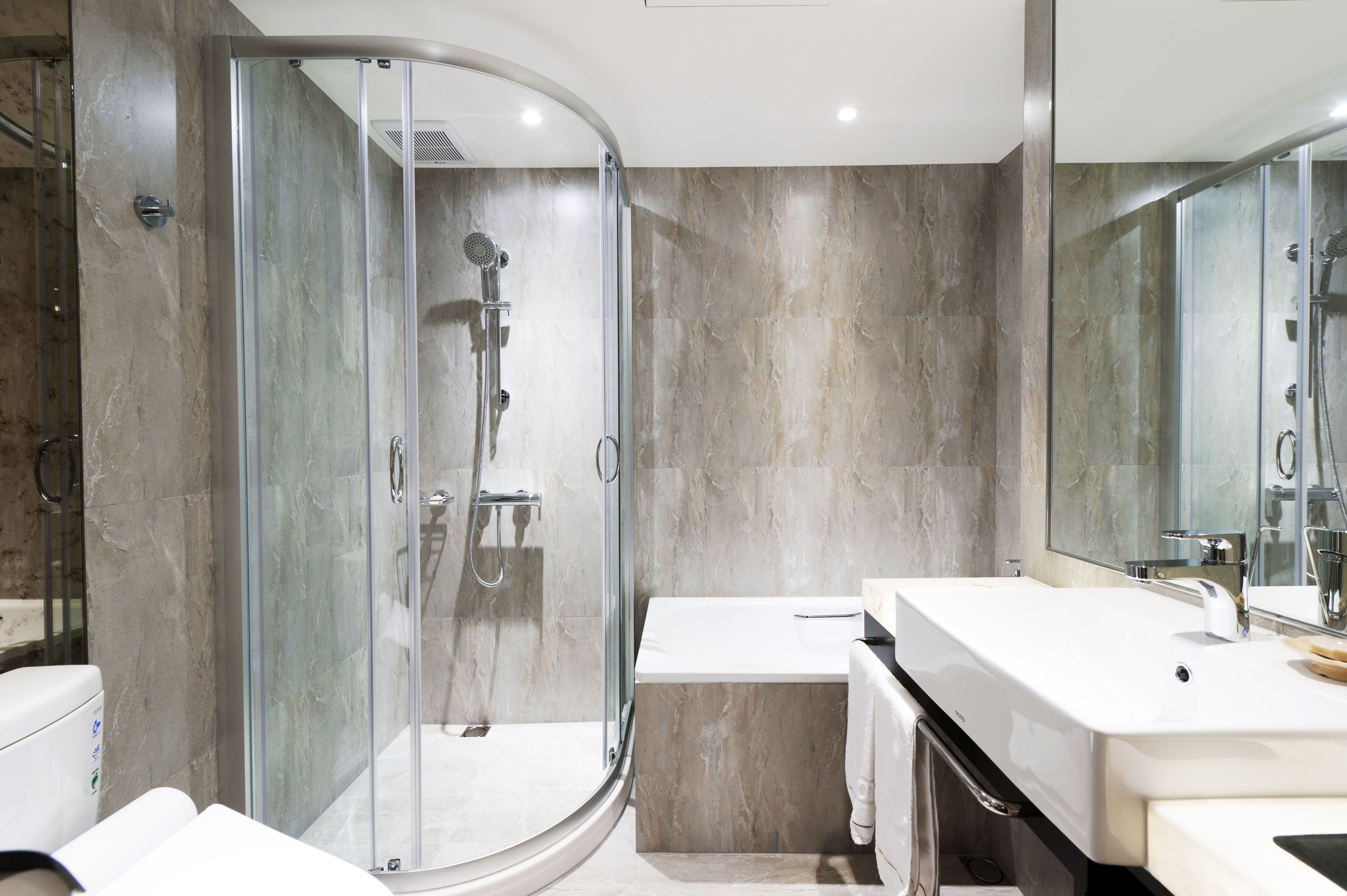 hair dryer, bidet, towels