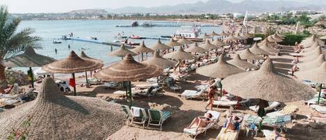 On the beach, white sand, scuba diving, waterskiing
