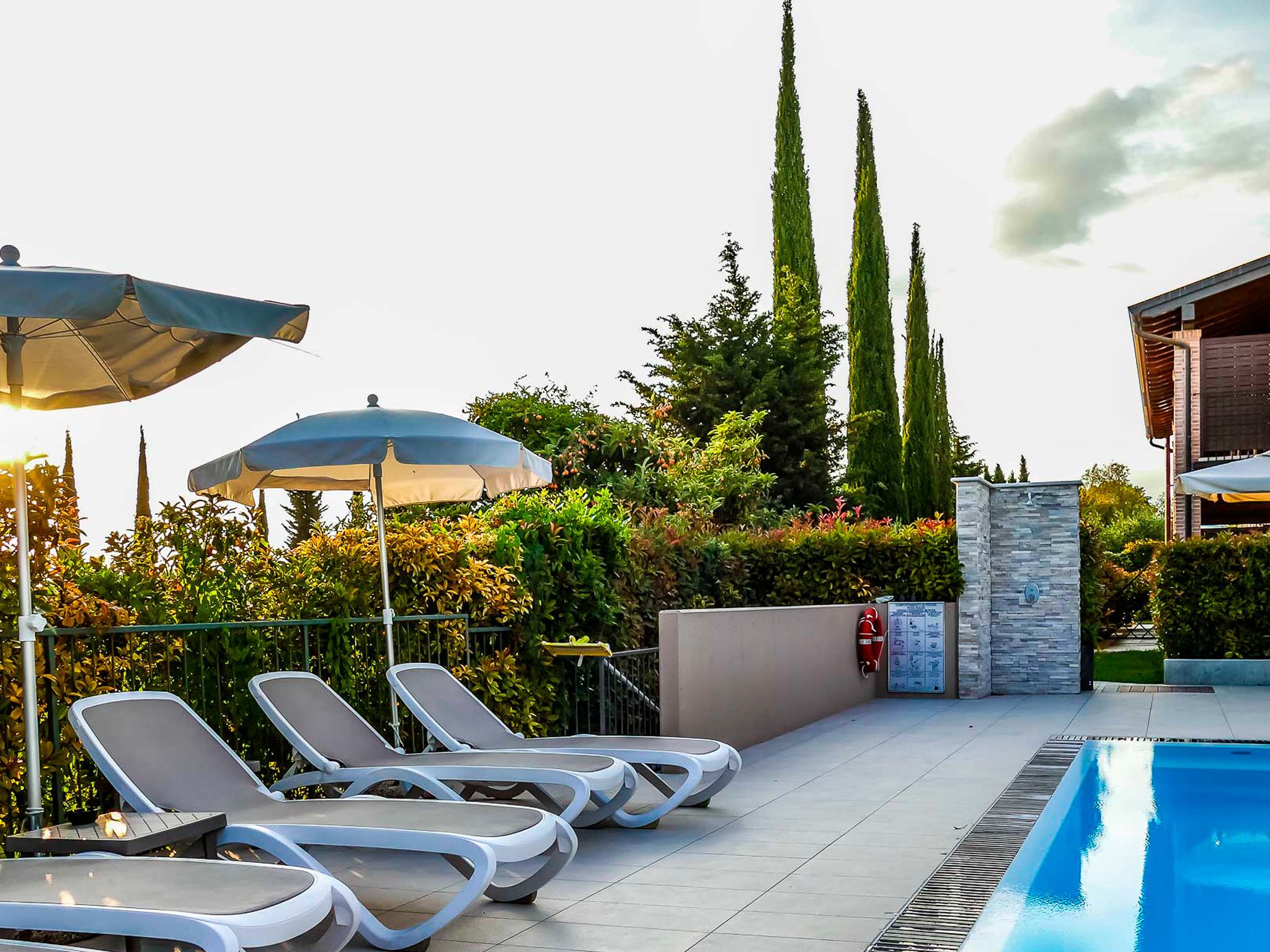 Outdoor pool, open 8:00 AM to 8:00 PM, pool umbrellas, sun loungers