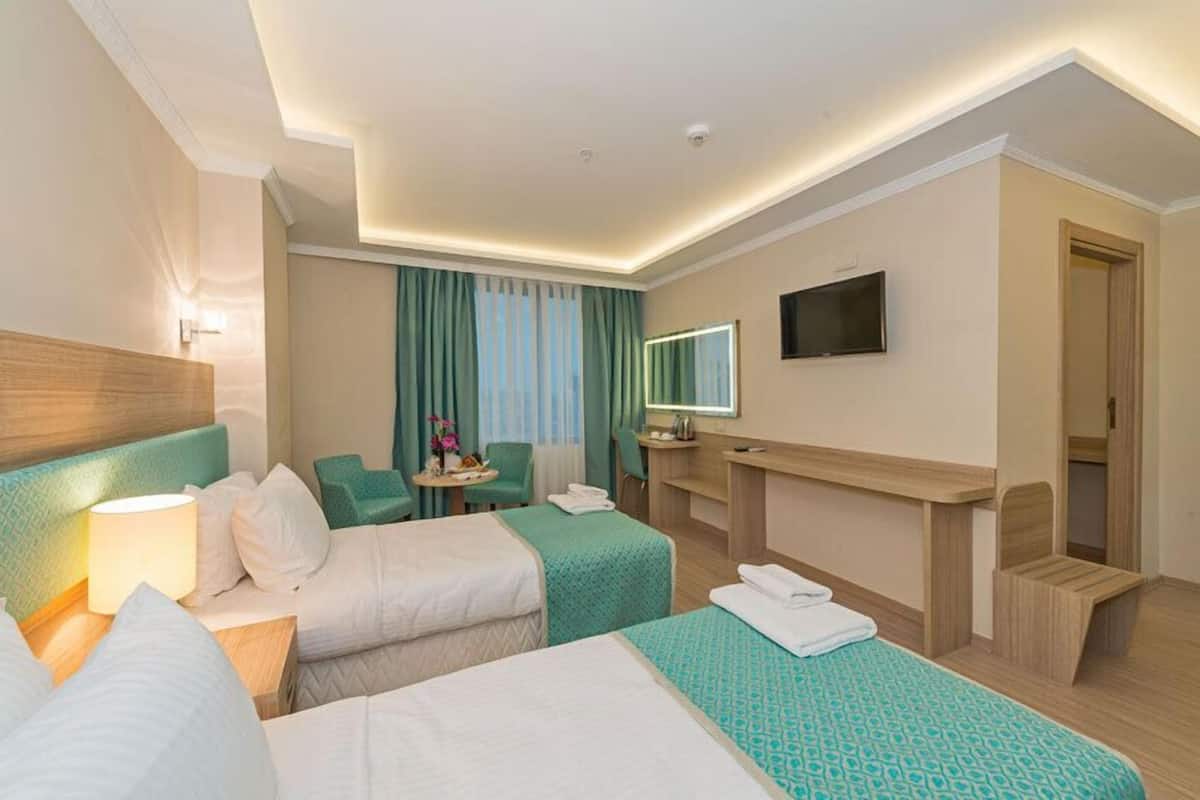 Biancheria da letto di alta qualità, minibar, cassaforte in camera
