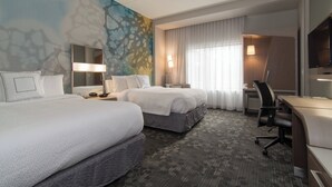 A hotel room with two beds, a desk, a chair, a TV, and a bathroom. - Courtyard Raleigh-Durham Airport/Brier Creek (Raleigh)