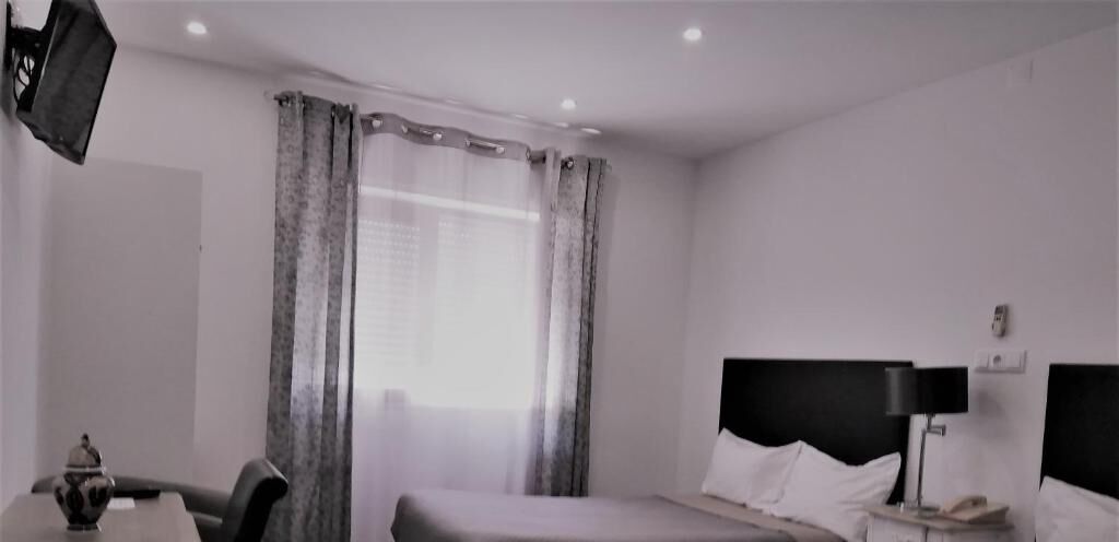 individually decorated, individually furnished, desk, blackout curtains