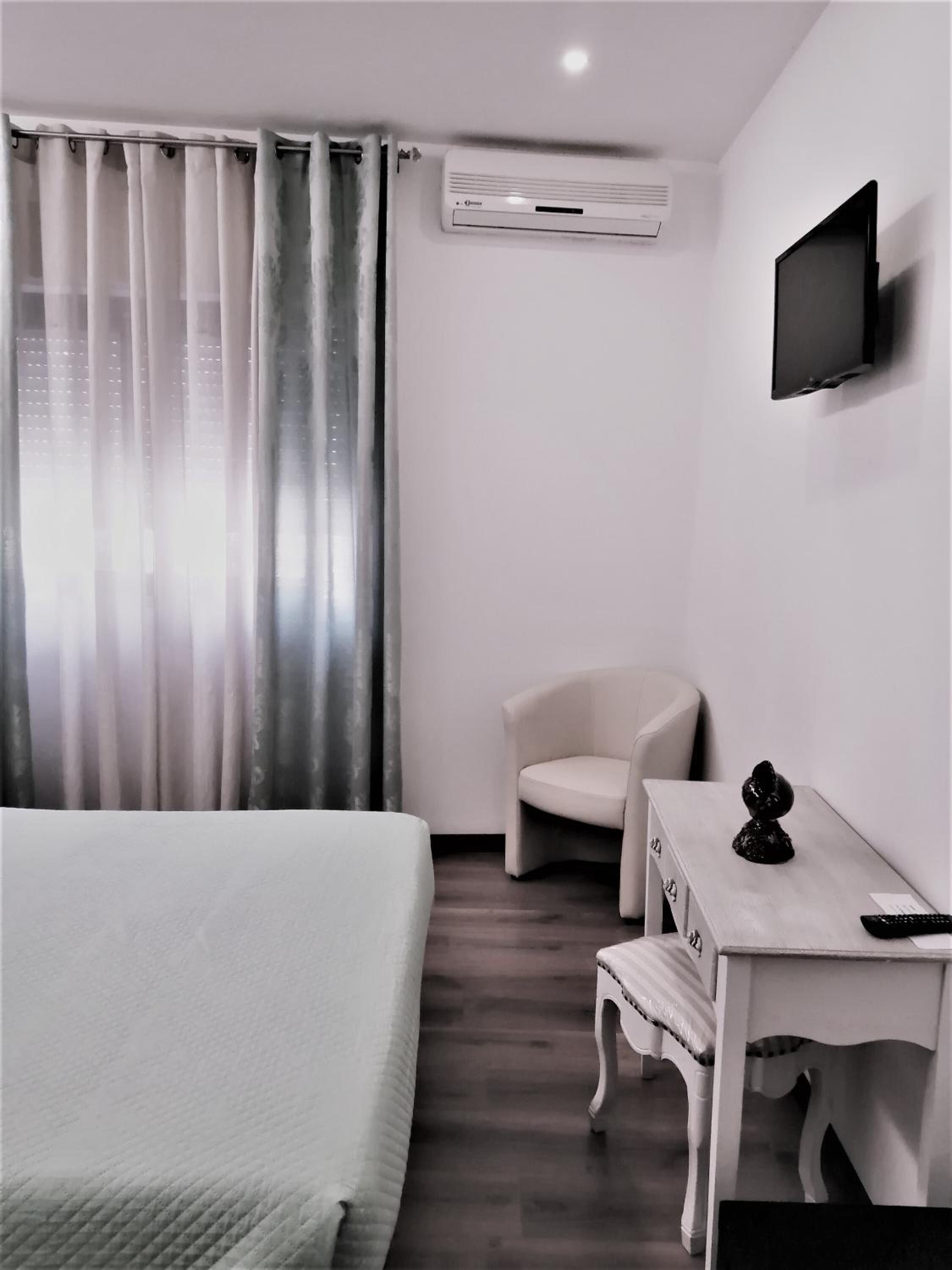 individually decorated, individually furnished, desk, blackout curtains