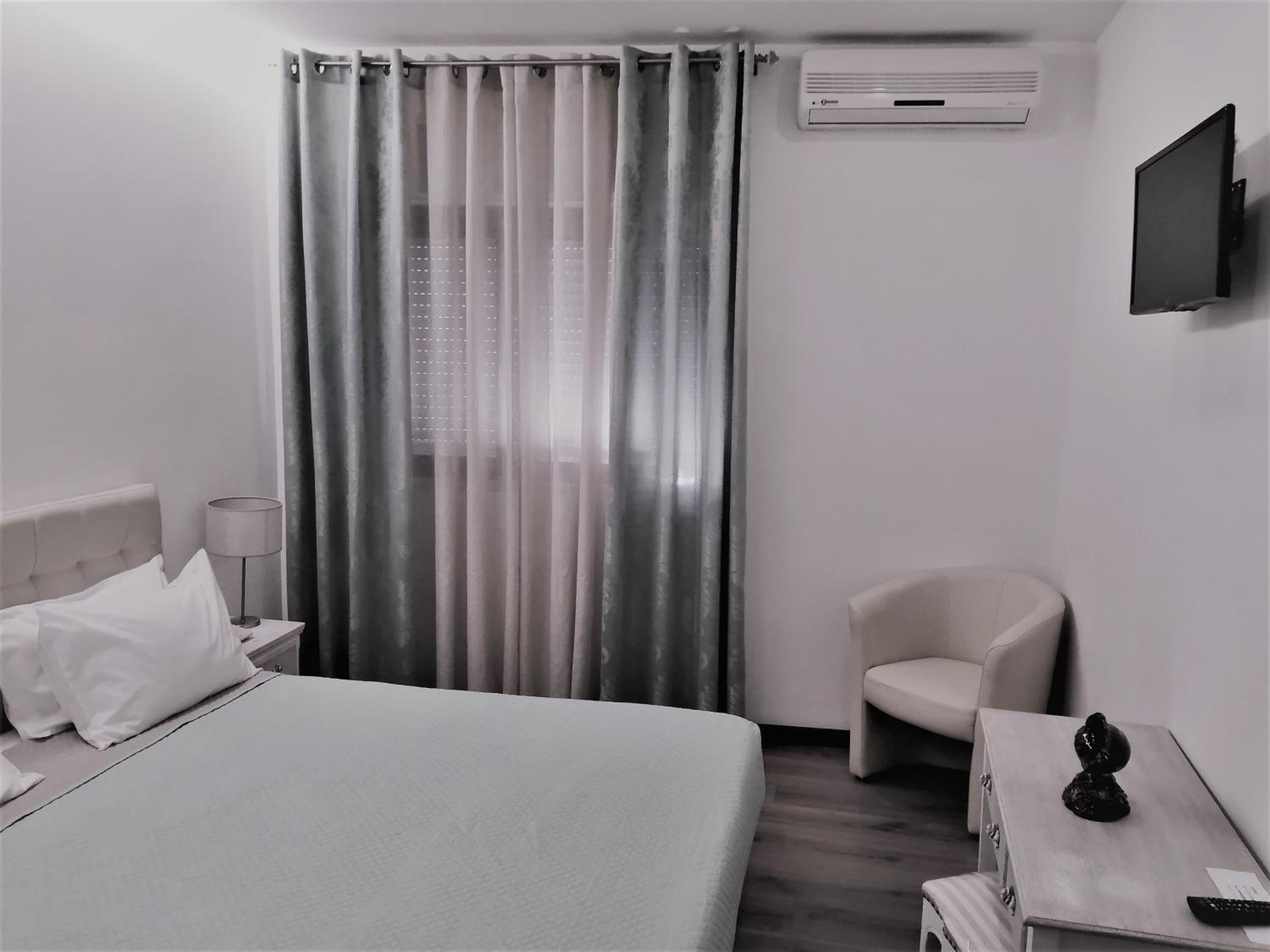 individually decorated, individually furnished, desk, blackout curtains