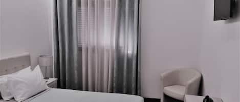 Individually decorated, individually furnished, desk, blackout curtains