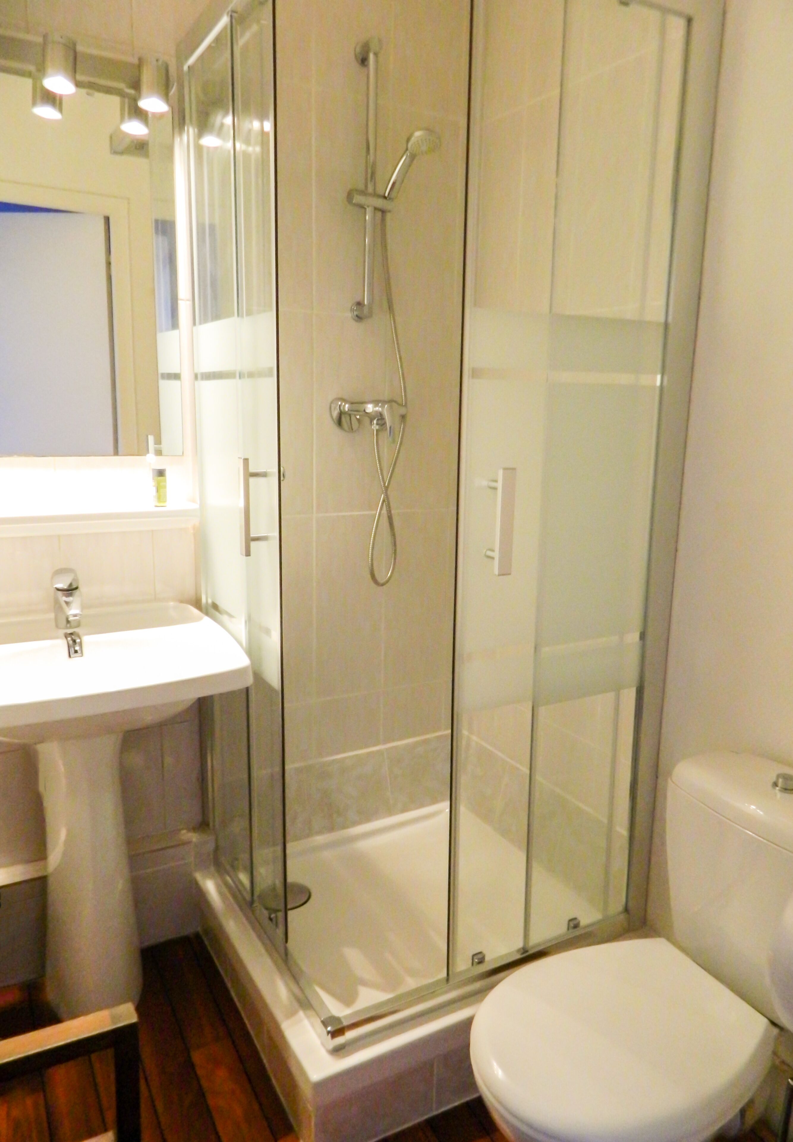 quadruple room | bathroom | shower, free toiletries, towels, soap