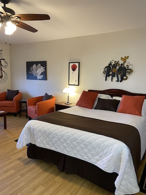 Suite, 1 Queen Bed, Accessible (Main Floor) | Premium bedding, individually decorated, individually furnished, desk