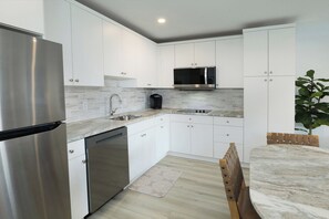 Deluxe Suite (Townhouse Apartment) | Private kitchen | Coffee/tea maker - Matador Oceanfront Resort (North Wildwood)