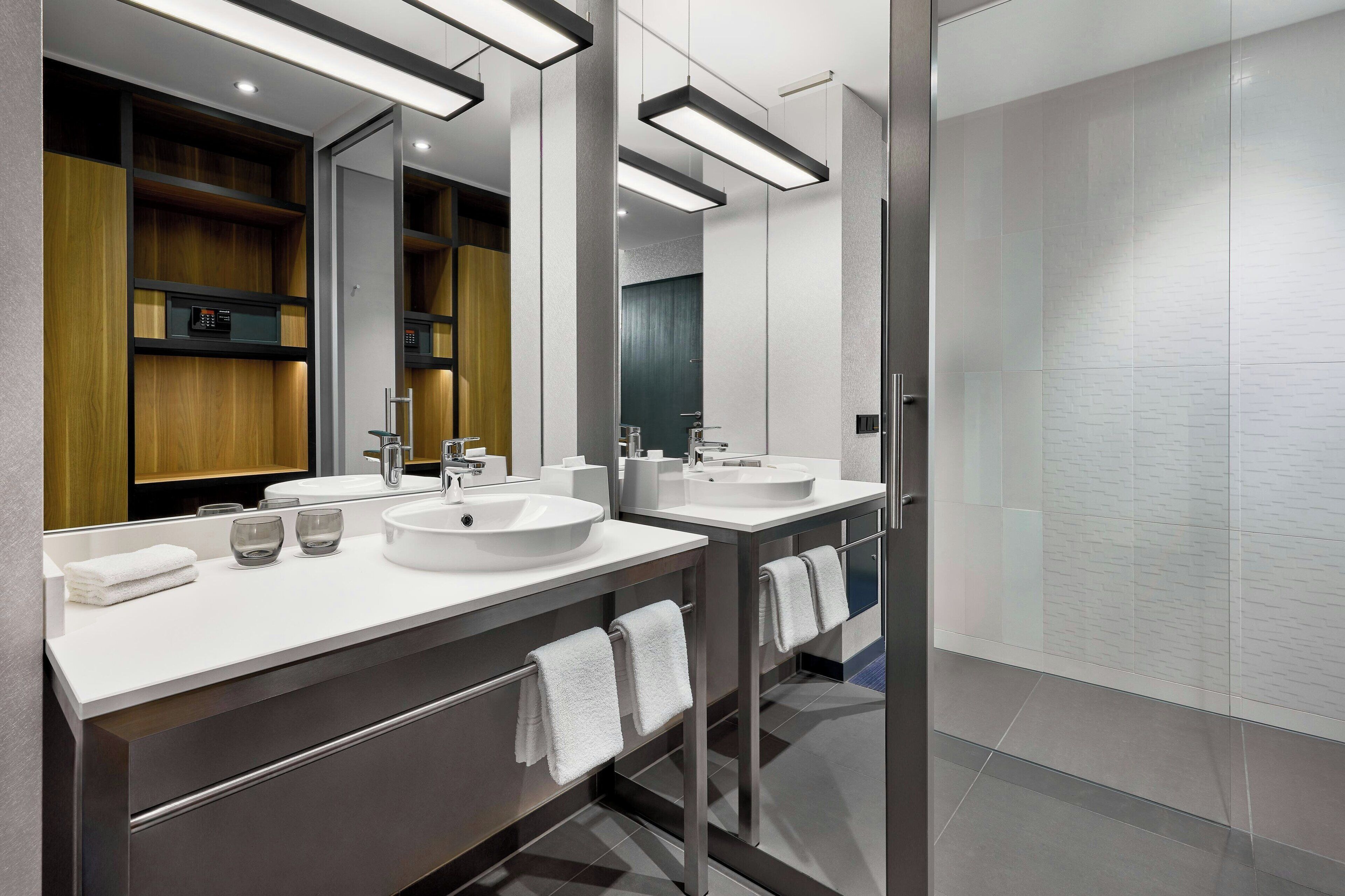 shower, eco-friendly toiletries, hair dryer, towels