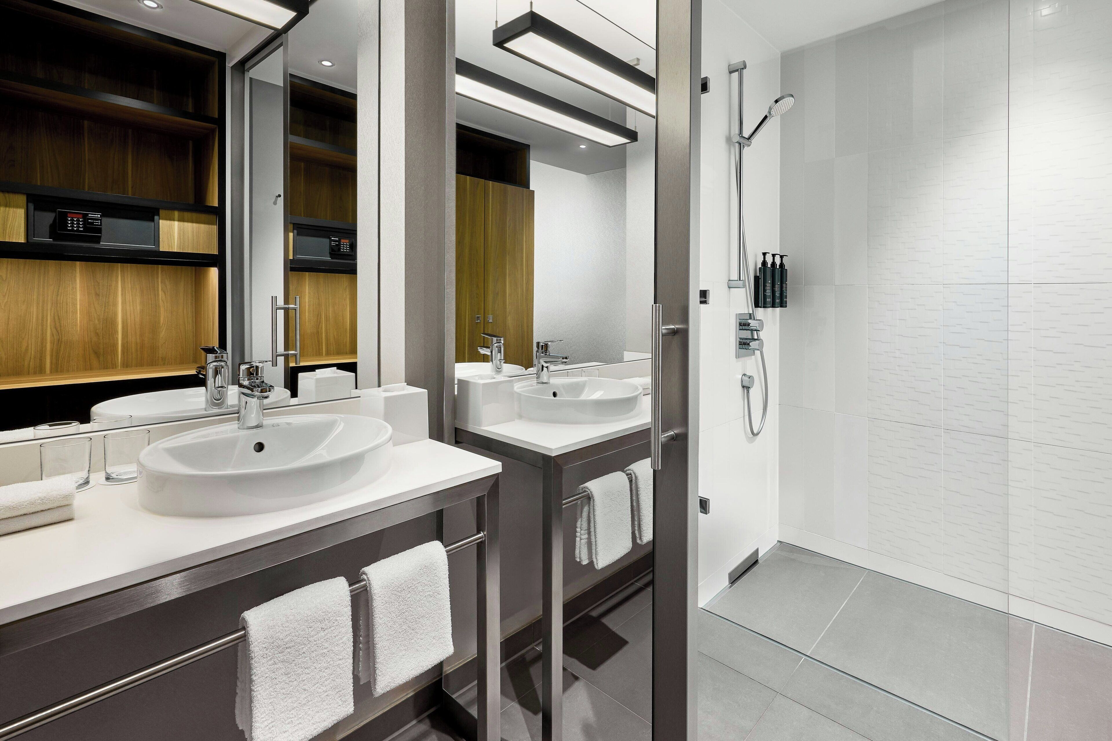 shower, eco-friendly toiletries, hair dryer, towels