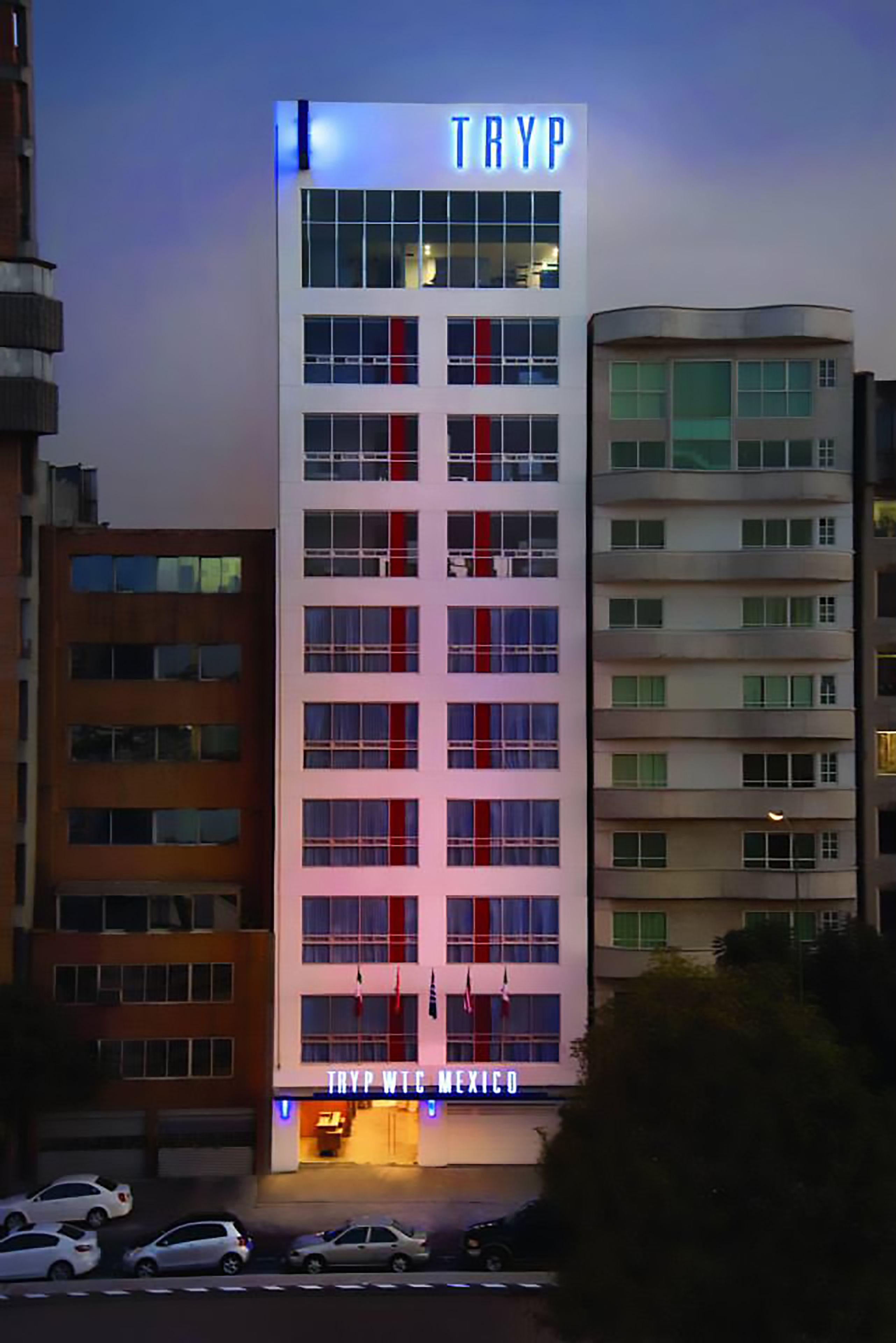 A multi-story building with the sign "TRYP" and "TRYP WICHE MEXICO" indicating it is a hotel.