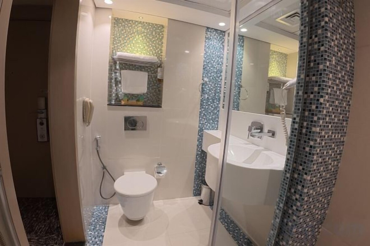 Bathroom | Shower, free toiletries, hair dryer, slippers