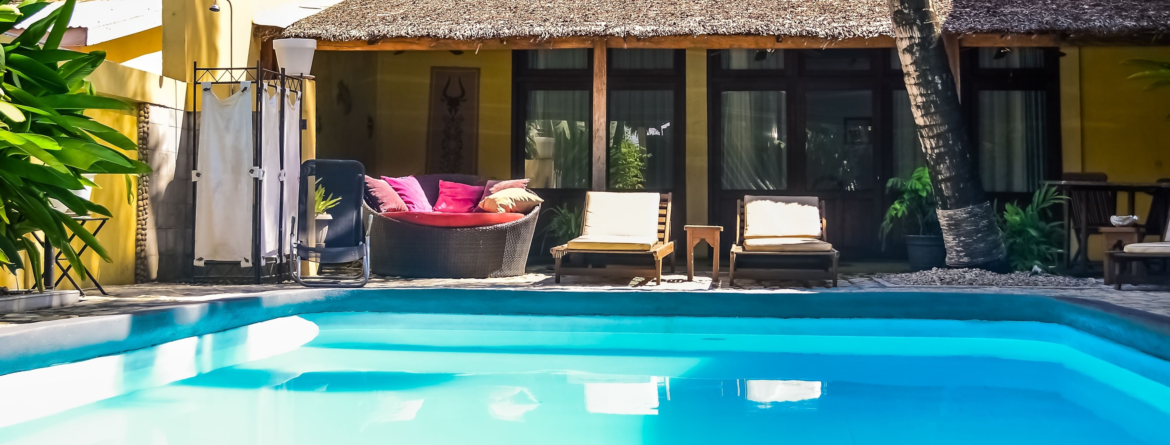 outdoor pool, pool umbrellas, pool loungers