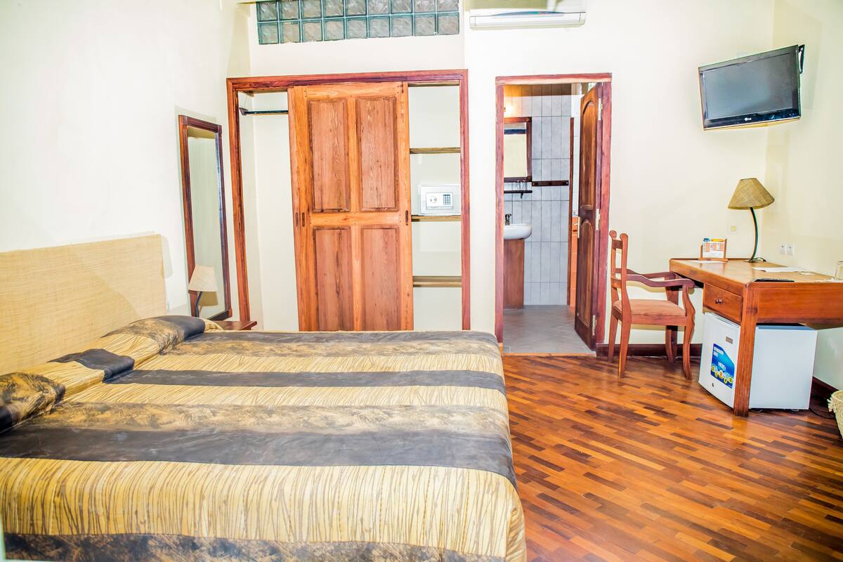 Ropa de cama de alta calidad y minibar