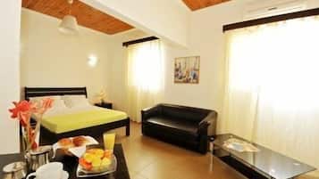 Premium Suite, 1 Bedroom, Private Bathroom, Ground Floor | Premium bedding, minibar, in-room safe, desk