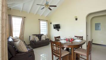 Deluxe Villa, 2 Bedrooms | Living area | 32-inch flat-screen TV with cable channels, TV