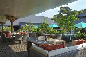 Breakfast, lunch, dinner served; international cuisine, pool views