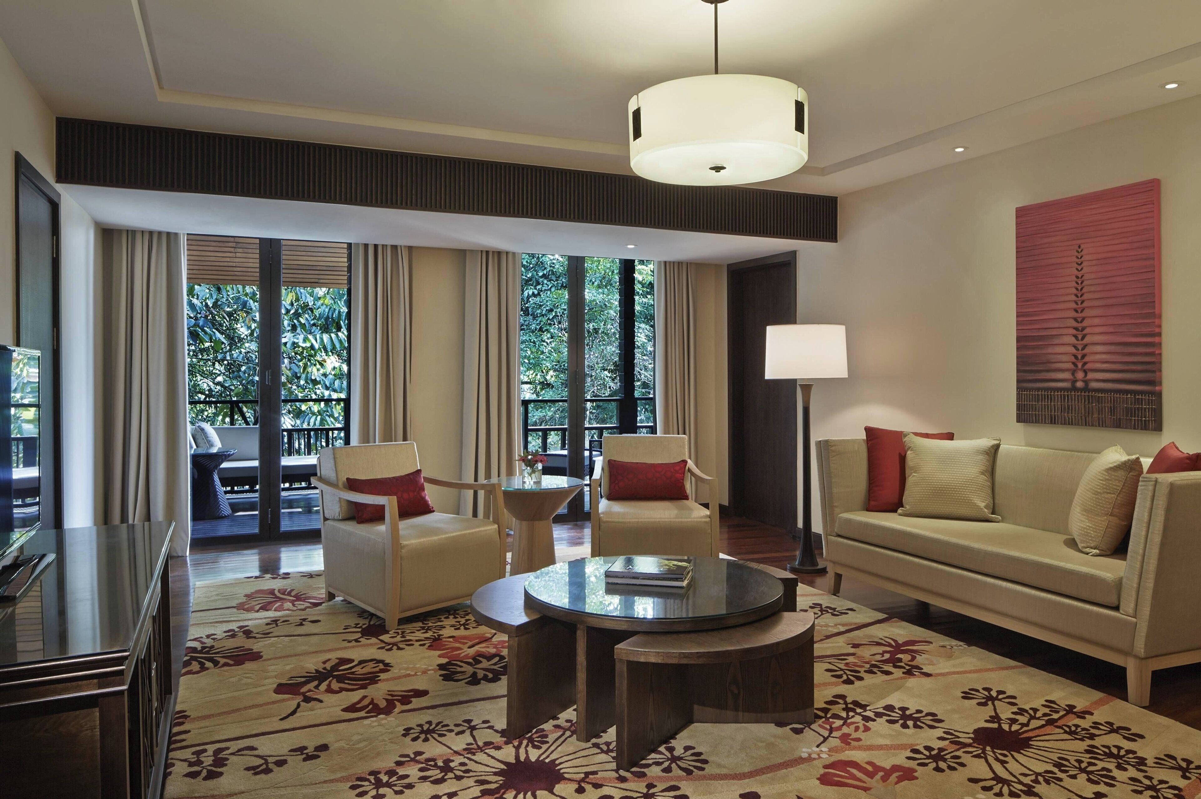 suite, 1 king bed, balcony | living area | 48-inch led tv with satellite channels, tv