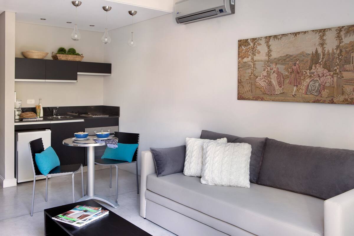 Superior Room | Living area | 32-inch LCD TV with cable channels, TV