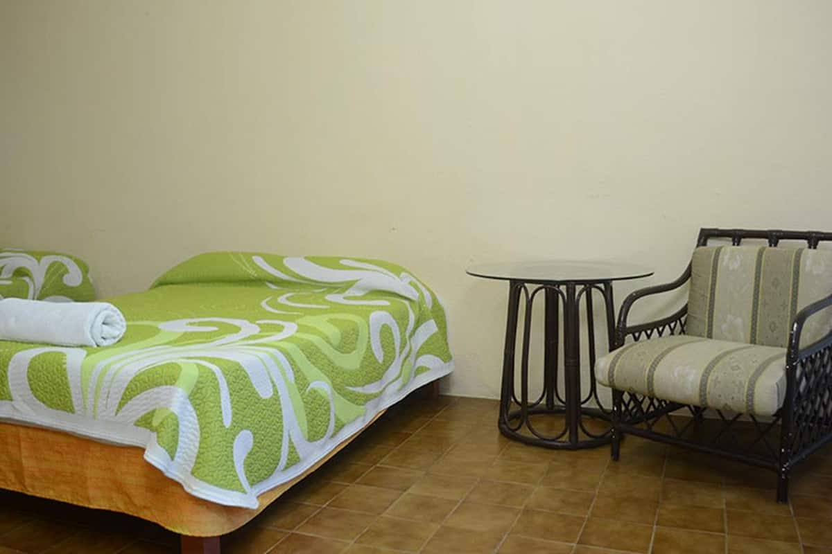 Premium bedding, blackout curtains, iron/ironing board, bed sheets