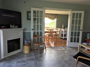 Luxury Cottage, 2 Bedrooms, Patio, Bay View (Near Beach) | Living area | 52-inch flat-screen TV with satellite channels, TV, pay movies