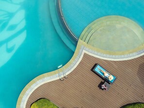 Outdoor pool, pool umbrellas - Namah Resort Jim Corbett, a member of Radisson Individuals (Ramnagar)