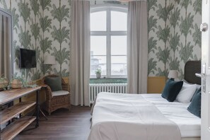 Sábanas de algodón egipcio, cortinas blackout y wifi gratis 