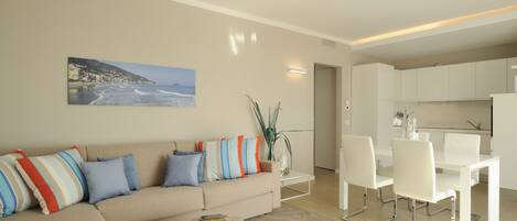 Penthouse, 2 Bedrooms | Living room | 25-inch flat-screen TV with premium TV channels, TV