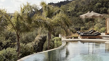 Seasonal outdoor pool, free pool cabanas, pool umbrellas