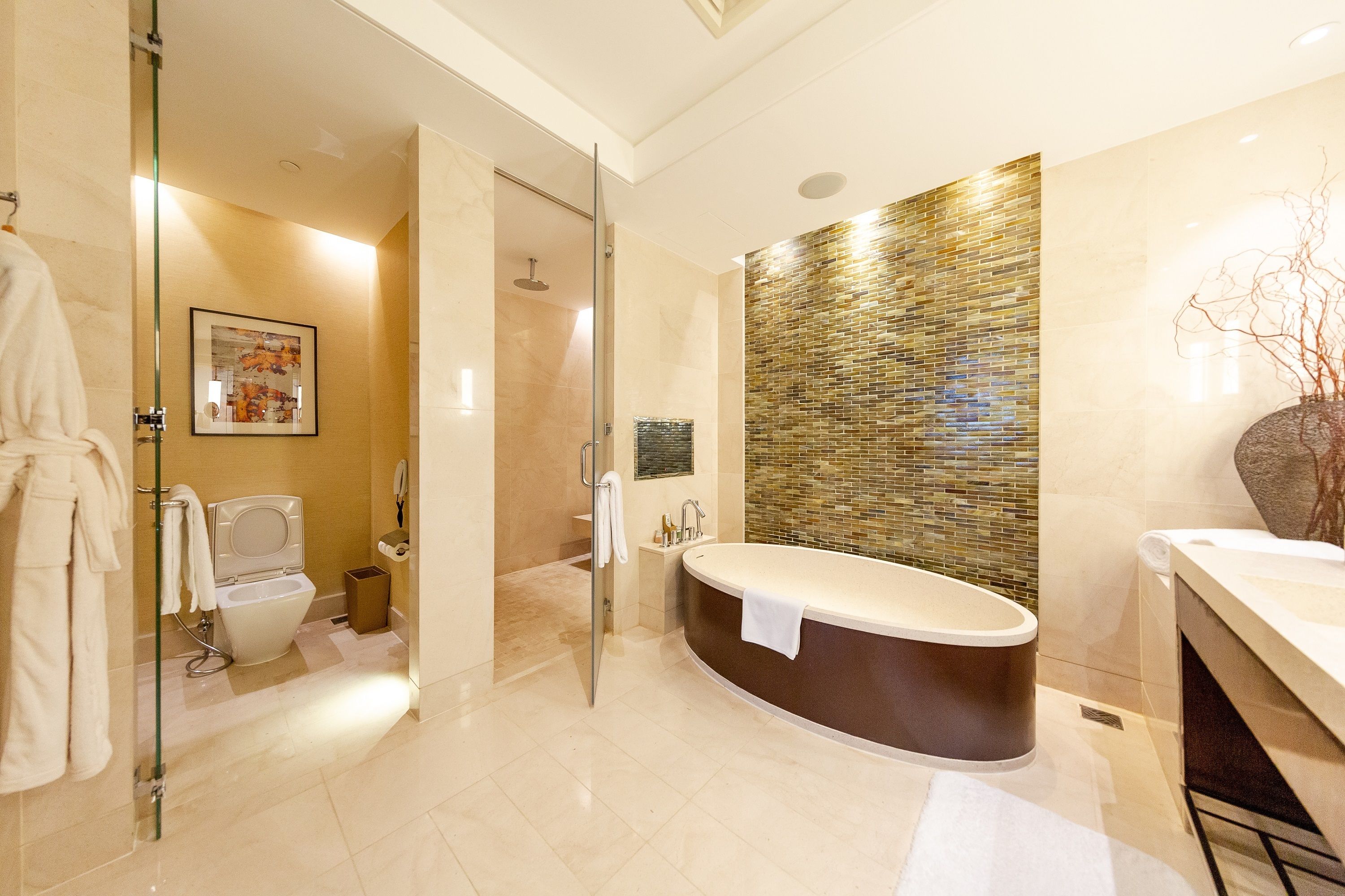 premier suite | bathroom | separate bathtub and shower, rainfall showerhead, designer toiletries