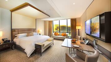 Deluxe Room, 1 King Bed | Premium bedding, minibar, in-room safe, desk