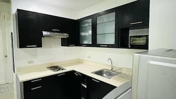 Apartment, 2 Bedrooms | Private kitchen | Fridge, microwave, stovetop, dishwasher