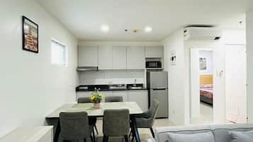 Apartment, 2 Bedrooms | Private kitchen | Fridge, microwave, stovetop, dishwasher