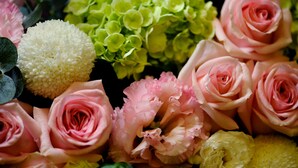 A bouquet of flowers including roses and hydrangeas. - Nei Jiang Hotel (Taipei)