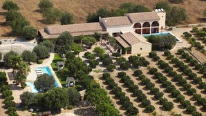 A large estate with a swimming pool, multiple buildings, and a landscaped garden. - Can Arabi Adults Only (Santa Eulalia del Rio)