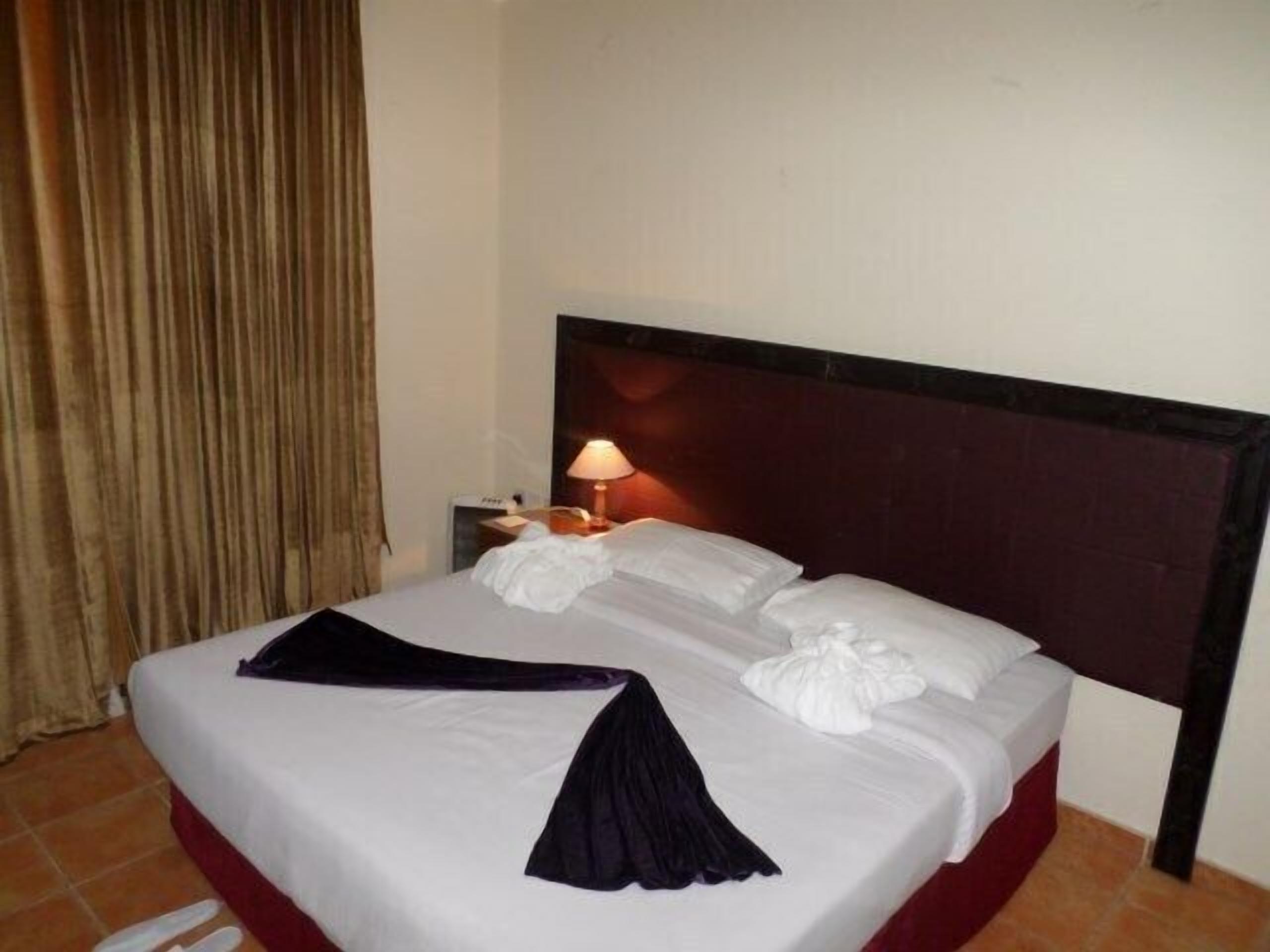 Premium bedding, pillow-top beds, free minibar, in-room safe