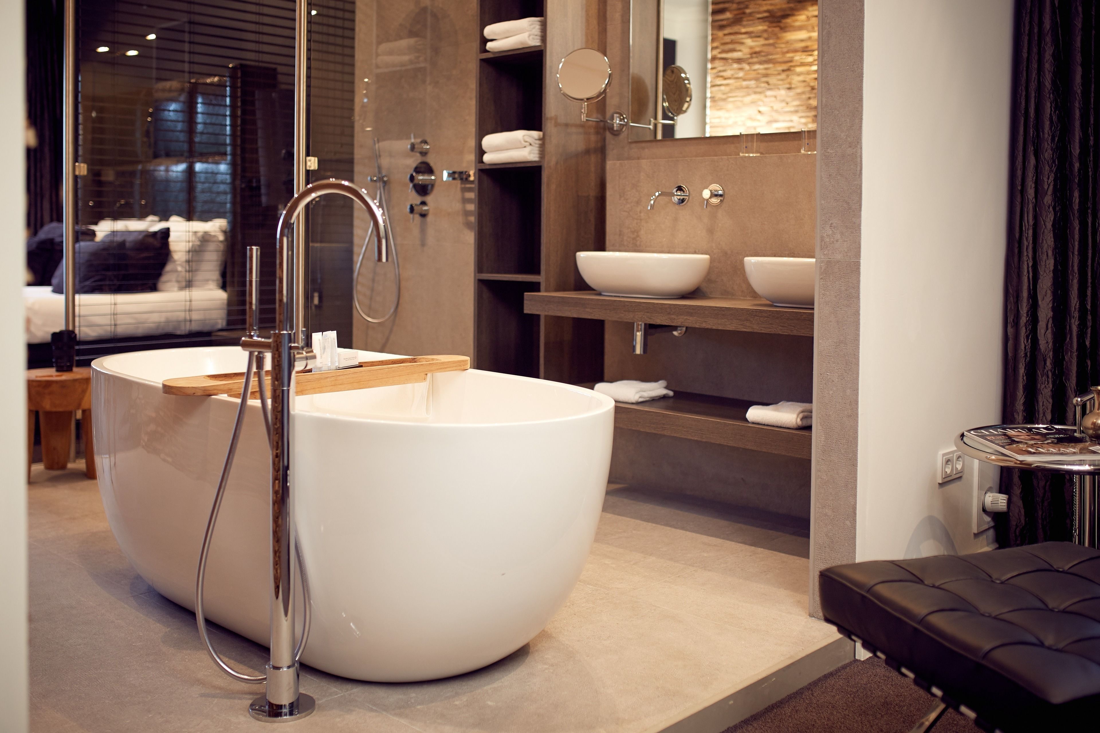 superior suite, garden view | bathroom | shower, free toiletries, hair dryer, towels