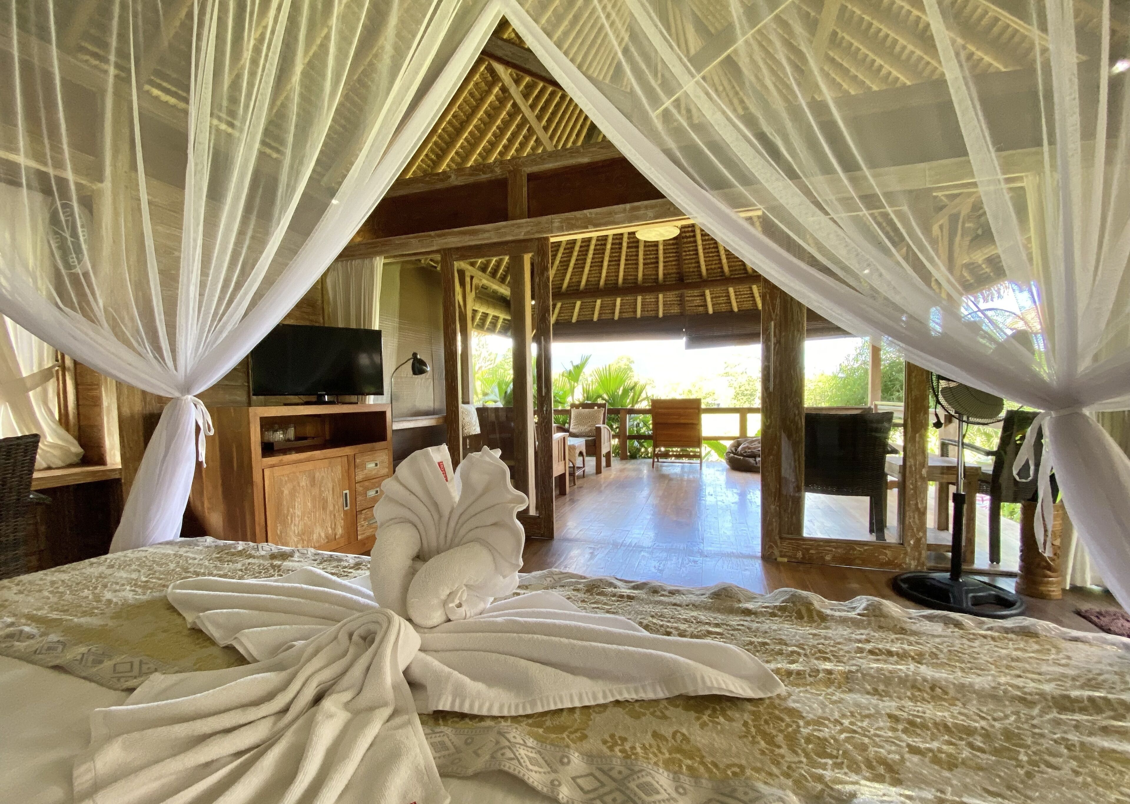 Private Wooden Bungalow | Minibar, in-room safe, desk, bed sheets