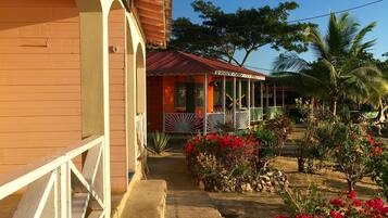 Standard Cabin, 1 Queen Bed, Beachfront | Individually decorated, individually furnished, free WiFi, bed sheets